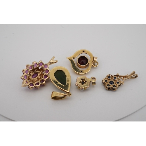 1937 - A modern 9ct gold and pear shaped nephrite set pendant, overall 25mm, a similar 9ct gold and garnet ... 