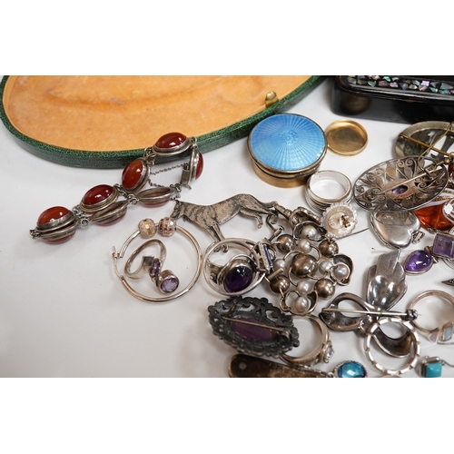 1938 - A quantity of assorted silver and costume jewellery including a Georg Jensen style brooch, a graduat... 