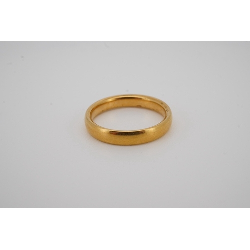 1940 - A George V 22ct gold wedding band, hallmarked for Birmingham, 1925, size N, 4.8 grams. Condition - f... 