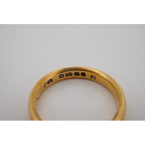 1940 - A George V 22ct gold wedding band, hallmarked for Birmingham, 1925, size N, 4.8 grams. Condition - f... 