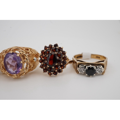 1941 - Five assorted modern 9ct gold and gem set rings, including two garner clusters, amethyst and seed pe... 