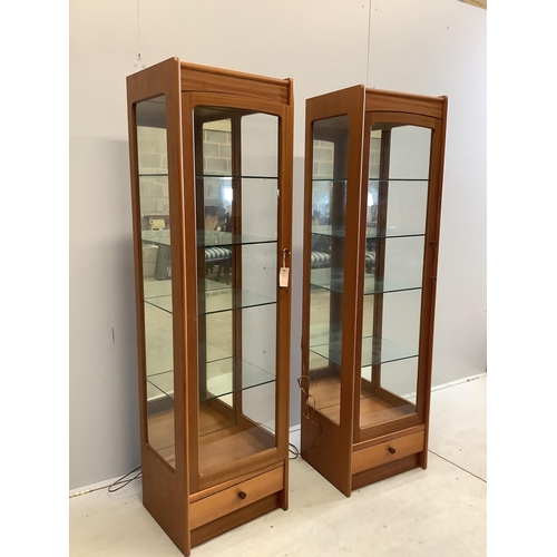 1 - A pair of Parker Knoll teak display cabinets, width 46cm, depth 38cm, height 165cm. Condition - good... 