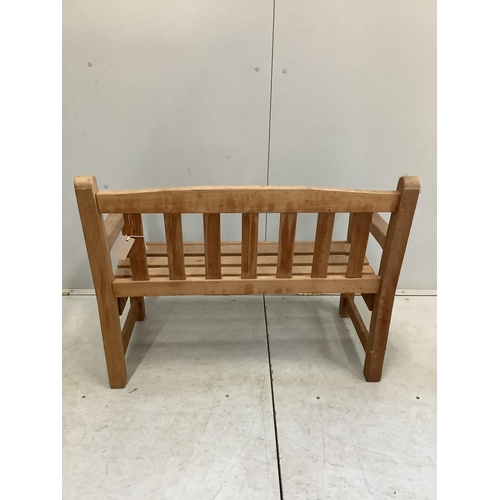 100 - A child's teak garden bench, width 86cm, depth 47cm, height 68cm. Condition - good