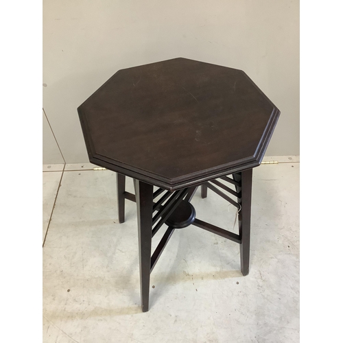 106 - In the manner of Godwin, a late Victorian octagonal mahogany occasional table, width 45cm, height 69... 