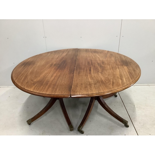 107 - A Regency mahogany D end extending dining table, 232cm extended, one spare leaf, depth 140cm, height... 