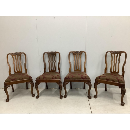 108 - A set of eight George II style mahogany dining chairs on cabriole legs and ball and claw feet, two w... 