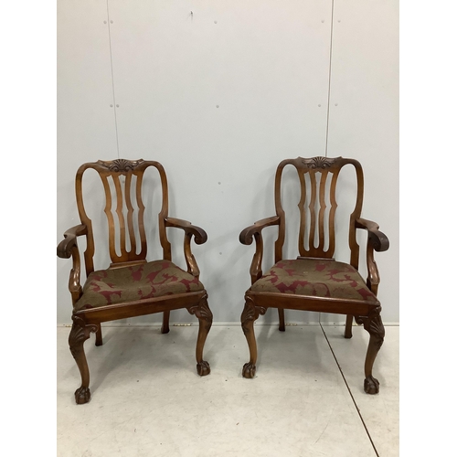 108 - A set of eight George II style mahogany dining chairs on cabriole legs and ball and claw feet, two w... 