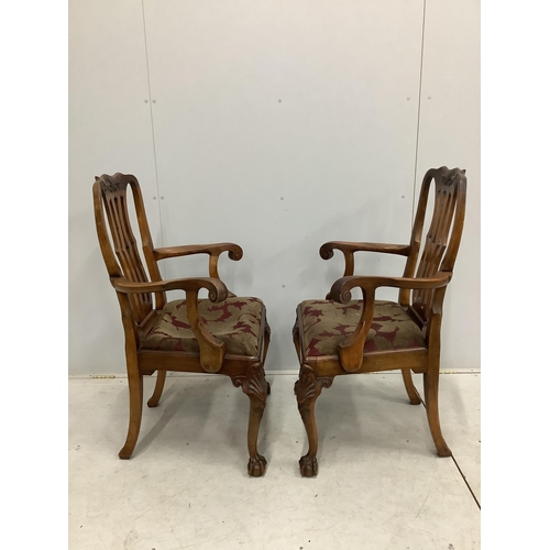 108 - A set of eight George II style mahogany dining chairs on cabriole legs and ball and claw feet, two w... 