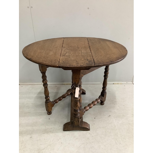 112 - A small 17th century style oak gateleg occasional table, width 65cm, depth 26cm, height 65cm. Condit... 