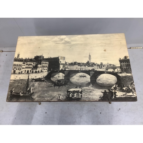 13 - An Italian Fornasetti style rectangular coffee table, printed with a Florence canal scene, width 65c... 