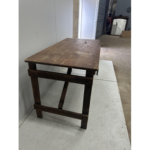 150 - A folding pine trestle table, width 136cm, depth 67cm, height 74cm. Condition - poor