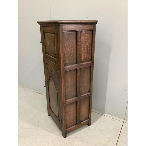 174 - A 17th century style Ipswich oak cabinet, width 56cm, depth 42cm, height 129cm. Condition - fair to ... 