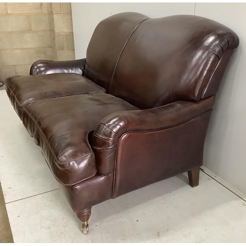 176 - A modern Howard style brown leather two seater settee, width 158cm, depth 88cm, height 88cm. Conditi... 