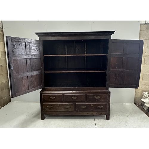 180 - An 18th century panelled oak press cupboard, width 150cm, depth 65cm, height 183cm. Condition - poor... 