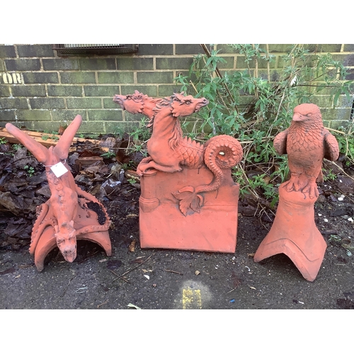 184 - Three terracotta ridge tiles. Condition - largest height 52cm. Condition - fair to good