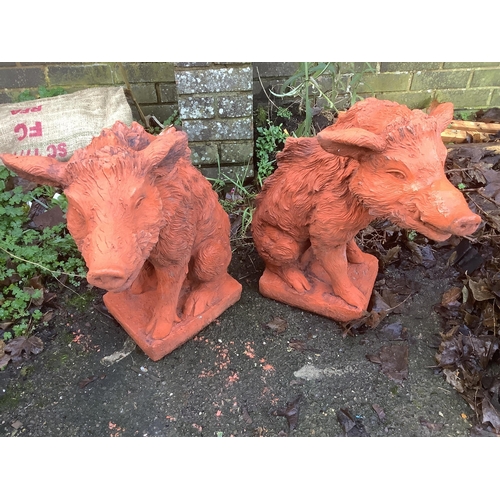 185 - A pair of terracotta boars. Condition