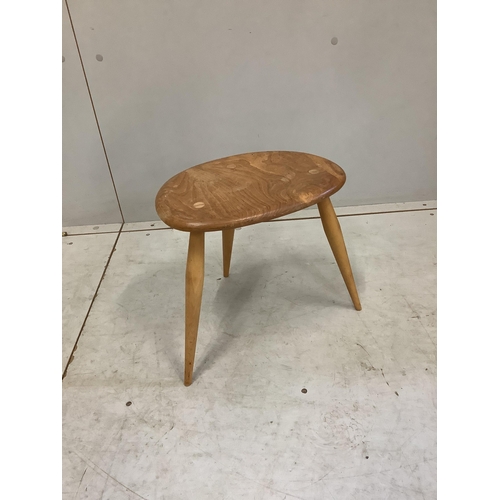 19 - An Ercol oval elm coffee table and a nest of two tables, largest width 98cm, depth 84cm, height 44cm... 