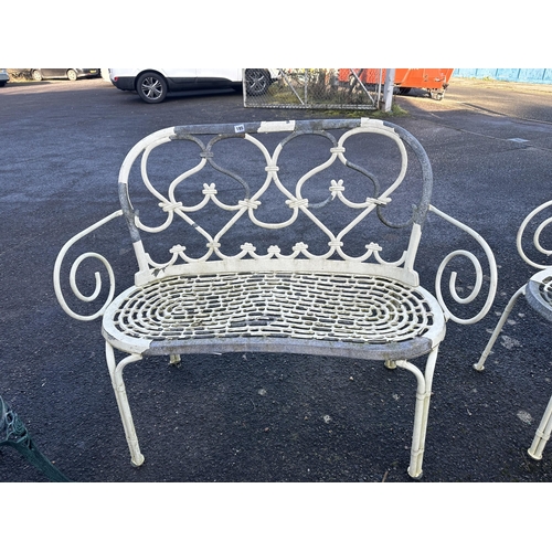 195 - An aluminium garden table, width 150cm, depth 96cm, height 71cm, three chairs and a bench. Condition... 