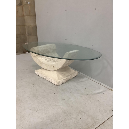 61 - A Contemporary Italian design oval glass coffee table on composite 'C' scroll base, width 130cm, dep... 