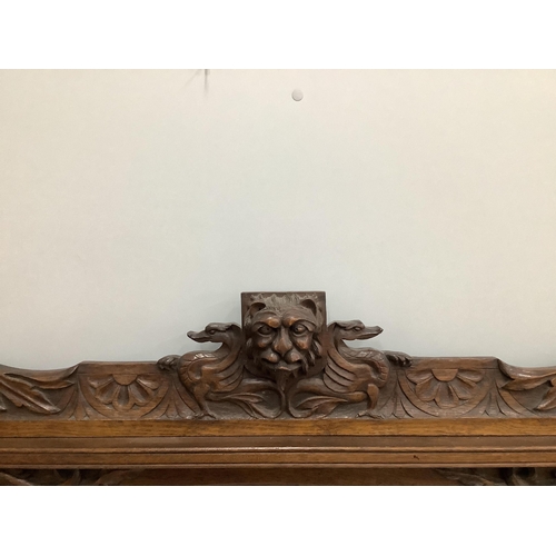 80 - A Victorian carved oak overmantel mirror, width 120cm, height 152cm. Condition - fair