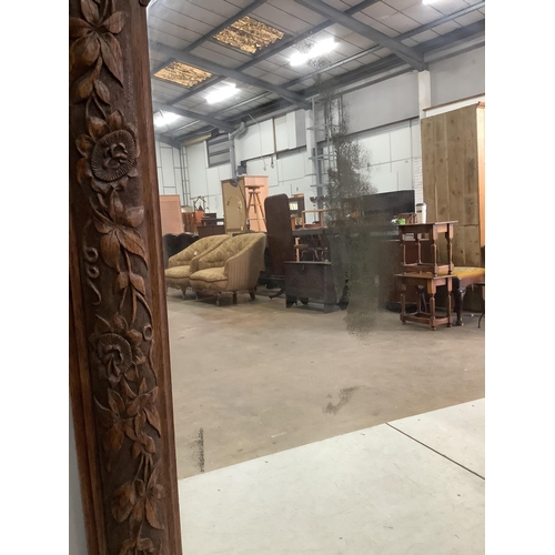 80 - A Victorian carved oak overmantel mirror, width 120cm, height 152cm. Condition - fair