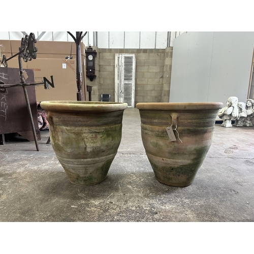 81 - A pair of terracotta planters, diameter 46cm, height 45cm. Condition - fair to good