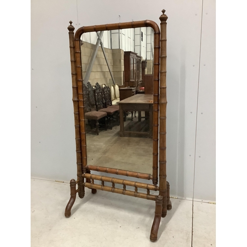 87 - A 19th century French faux bamboo cheval mirror, width 87cm, height 170cm. Condition - fair