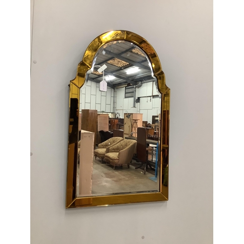 91 - An Art Deco style amber and clear glass wall mirror, width 54cm, height 89cm. Condition - fair... 