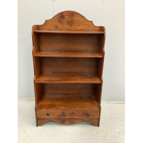 93 - A reproduction elm graduated open bookcase, width 70cm, height 121cm. Condition - fair to good... 