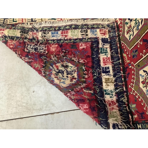 1015 - A Soumak flatweave rug, approximately 320 x 108cm. Condition - good