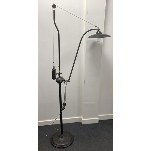 1092 - A pair of tall bronzed metal industrial style standard lamps, height 182cm. Condition - good