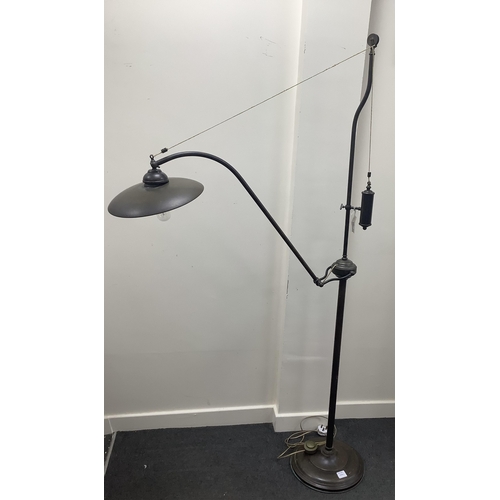 1092 - A pair of tall bronzed metal industrial style standard lamps, height 182cm. Condition - good