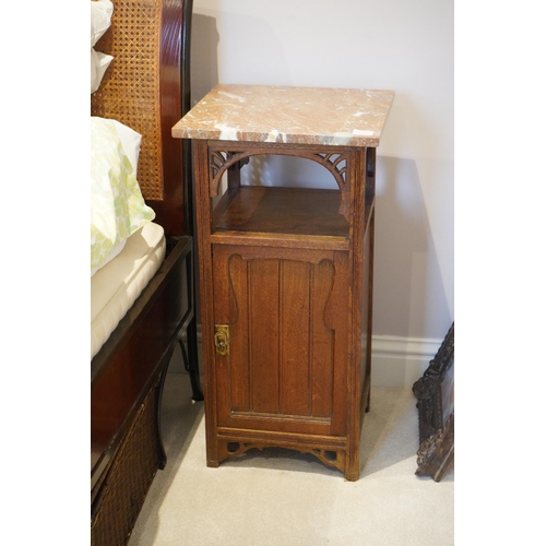 1105 - A pair of French Art Nouveau oak marble topped bedside cupboards, width 42cm, depth 42cm, height 81c... 