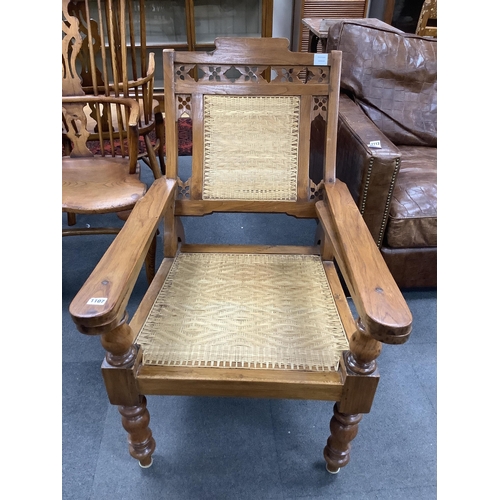 1107 - A mid 19th century Anglo Indian teak planter's chair, width 62cm, depth 84cm, height 92cm. Condition... 