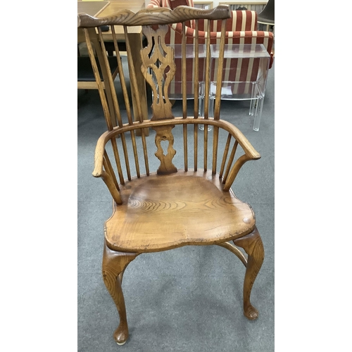 1108 - A set of six Titchmarsh & Goodwin elm Windsor chairs, two with arms. Condition - fair to good