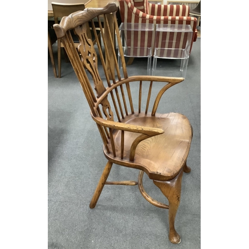 1108 - A set of six Titchmarsh & Goodwin elm Windsor chairs, two with arms. Condition - fair to good