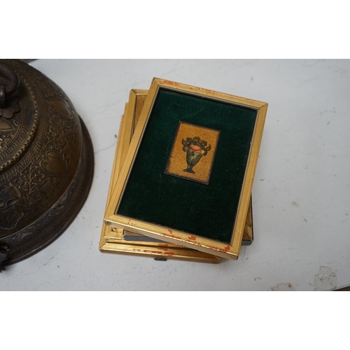 1643 - An Ethiopian Coptic processional cross, two Indian brass betel nut boxes together with other metalwa... 