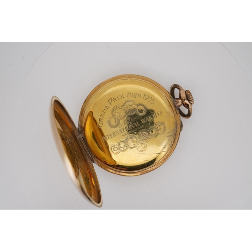 1905 - An engine turned gilt metal IWC open faced keyless dress pocket watch, with Arabic dial and subsidia... 