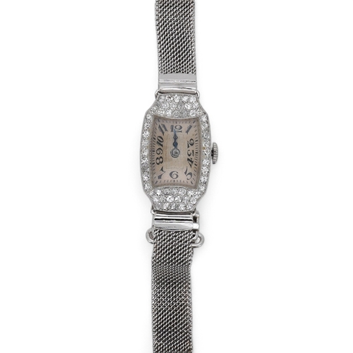 1923 - A lady's mid 20th century Swiss white metal(platinum mark) and diamond set cocktail watch with 'tumb... 