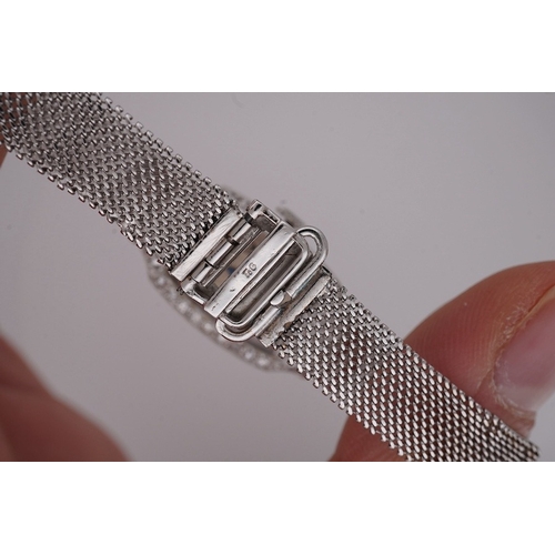 1923 - A lady's mid 20th century Swiss white metal(platinum mark) and diamond set cocktail watch with 'tumb... 