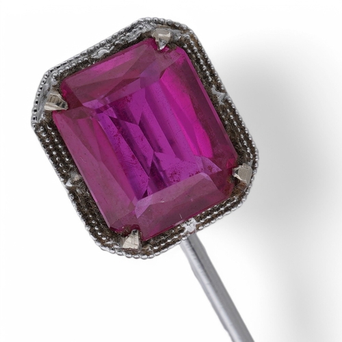 1926 - A North American? 10k white metal and single stone emerald cut synthetic ruby set stick pin, 55mm, g... 