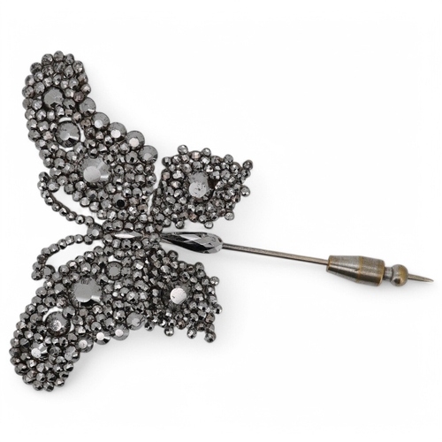 1927 - A late 19th century cut steel butterfly pin, 83mm. Condition - fair to good