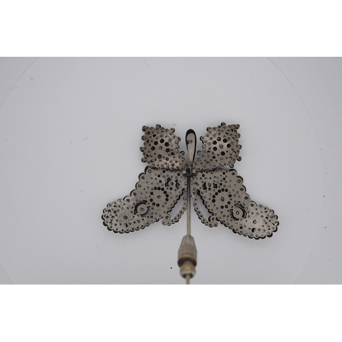 1927 - A late 19th century cut steel butterfly pin, 83mm. Condition - fair to good