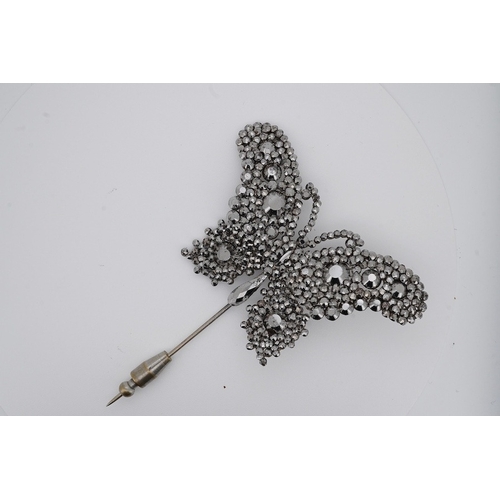 1927 - A late 19th century cut steel butterfly pin, 83mm. Condition - fair to good