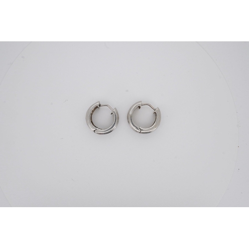 1929 - A pair of white metal and gypsy set five stone diamond hoop earrings, diameter 17mm, gross weight 8.... 