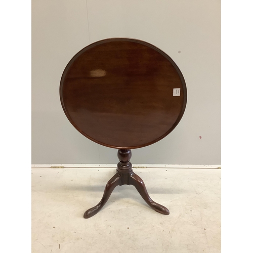 28 - A George III circular mahogany tilt top tripod tea table, diameter 63cm, height 69cm. Condition - fa... 