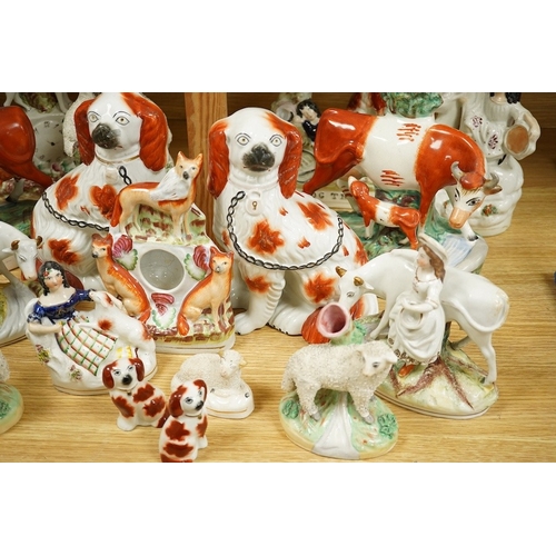 396 - Seventeen various animal related Staffordshire figures, tallest 27cm. Condition - varies