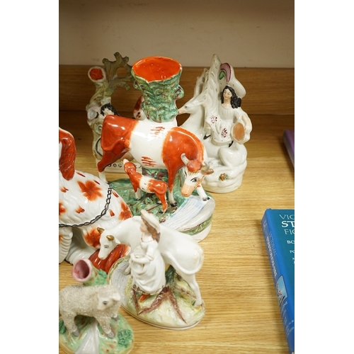 396 - Seventeen various animal related Staffordshire figures, tallest 27cm. Condition - varies