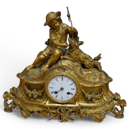 398 - An early 20th century French ormolu clock surmounted with a boy and dog, striking on a bell, 41cm wi... 