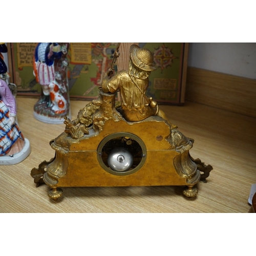 398 - An early 20th century French ormolu clock surmounted with a boy and dog, striking on a bell, 41cm wi... 